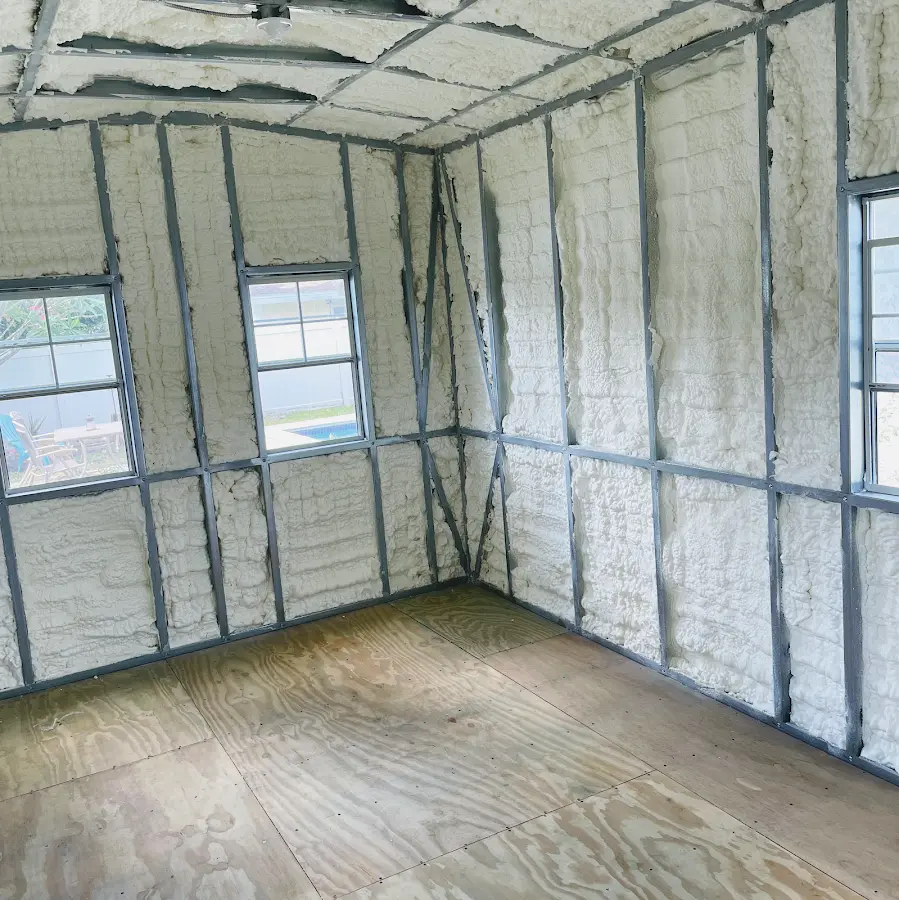 Closed-cell spray foam insulation applied to wall cavities in a residential project in Martinsville